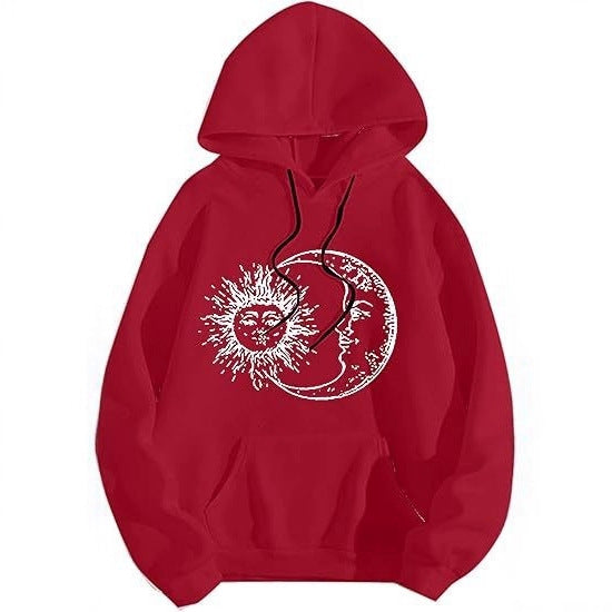 Kvinnors hoodie med konstnärligt sol-måne motiv Mirla-Eva Jonsson