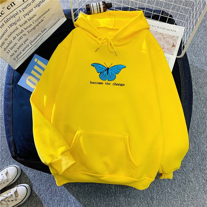 Kvinnors hoodie med kort skärning och unik fjärilsmotiv Mirla-Eva Jonsson