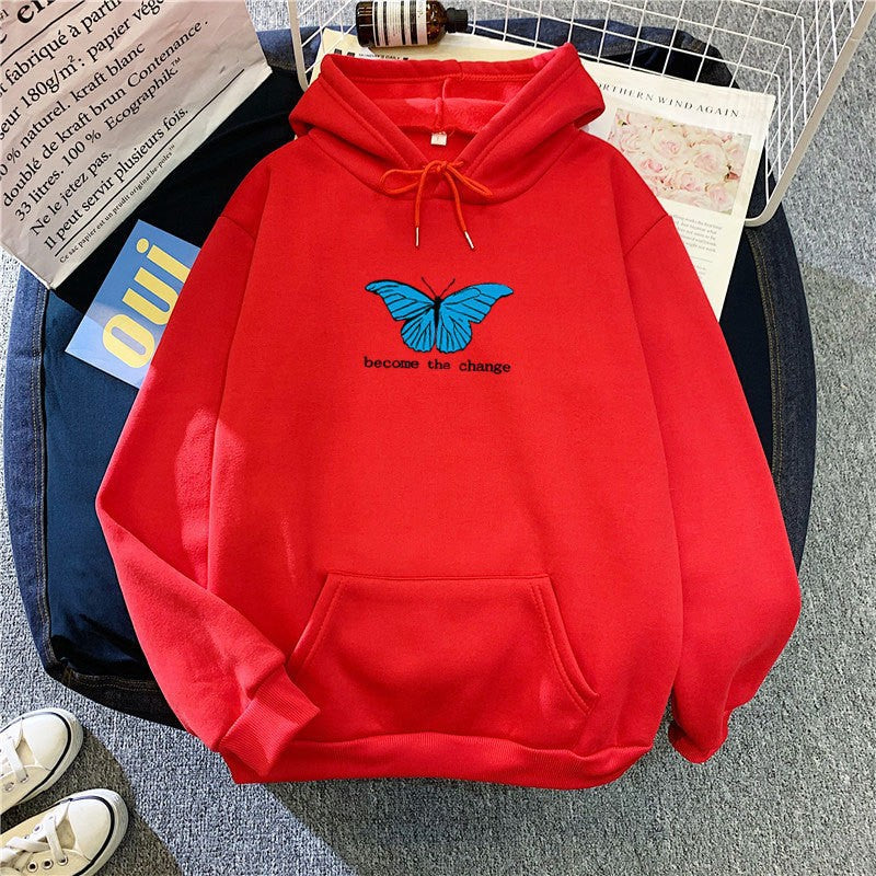 Kvinnors hoodie med kort skärning och unik fjärilsmotiv Mirla-Eva Jonsson