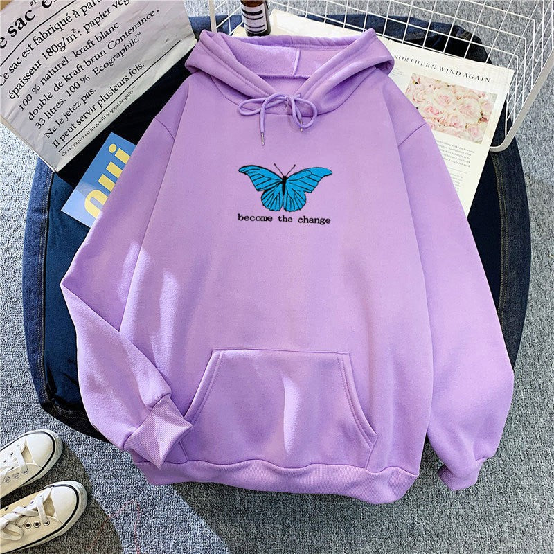Kvinnors hoodie med kort skärning och unik fjärilsmotiv Mirla-Eva Jonsson