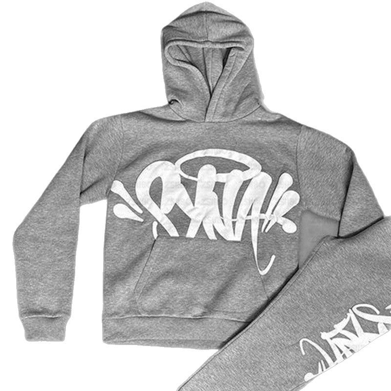 Kvinnors hoodie med kreativ graffiti design och praktiska kängurufickor Mirla-Eva Jonsson