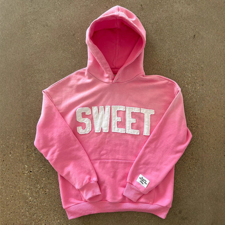 Kvinnors hoodie med kreativ text och mjukt innerfoder Mirla-Eva Jonsson