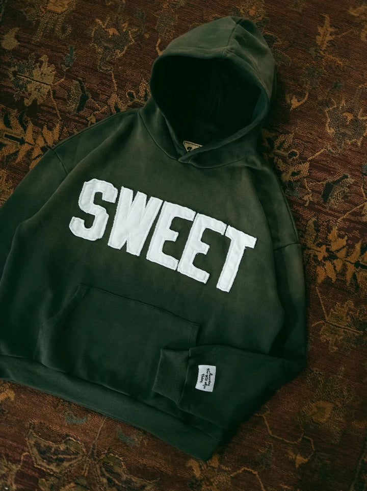 Kvinnors hoodie med kreativ text och mjukt innerfoder Mirla-Eva Jonsson