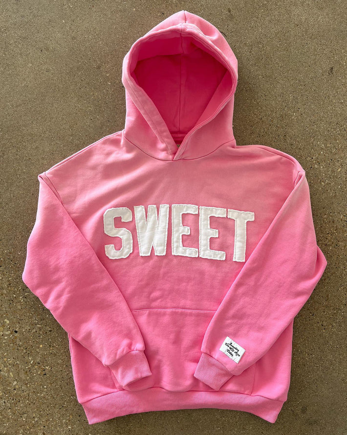 Kvinnors hoodie med kreativ text och mjukt innerfoder Mirla-Eva Jonsson