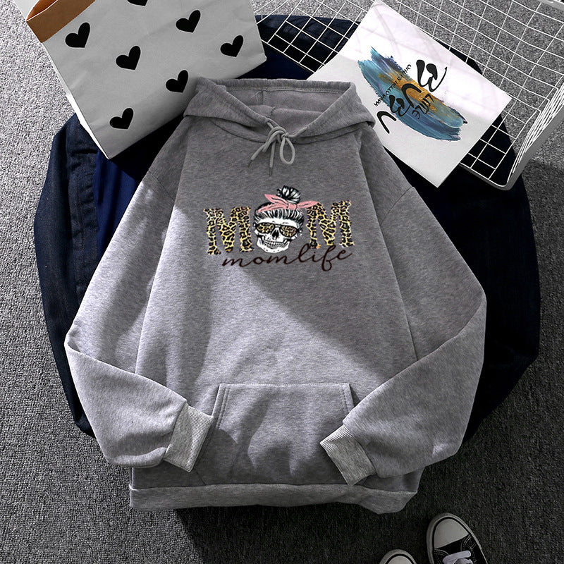 Kvinnors hoodie med kreativt döskallemönster Mirla-Eva Jonsson