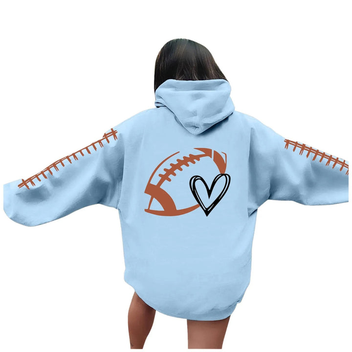 Kvinnors hoodie med kreativt fotbollsmotiv och avslappnad passform Mirla-Eva Jonsson