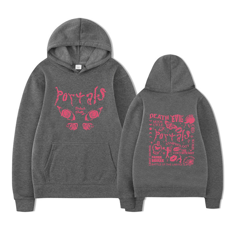 Kvinnors hoodie med kreativt motiv och bekväm passform Mirla-Eva Jonsson