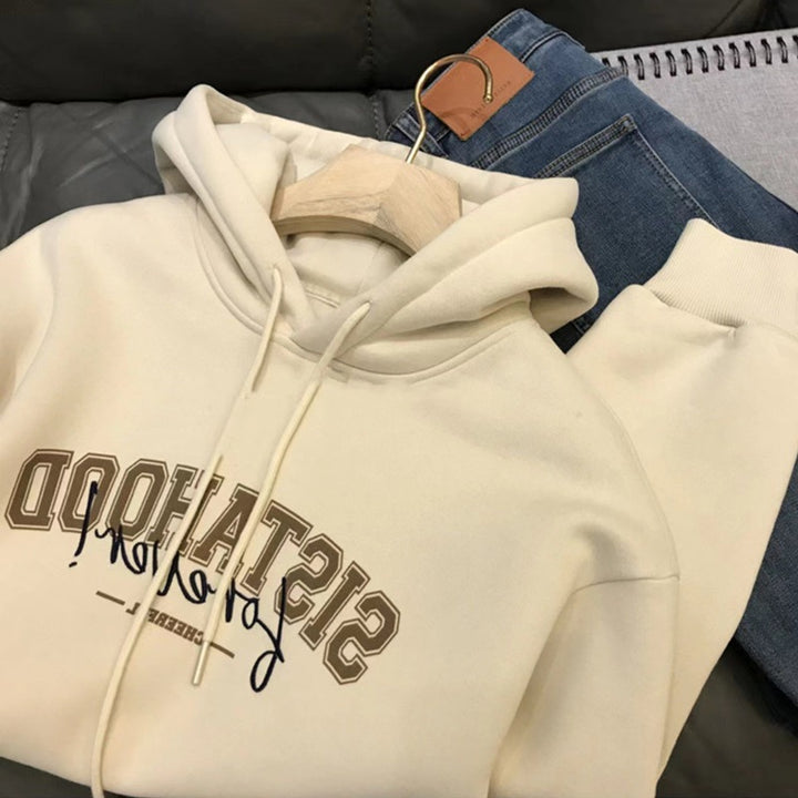 Kvinnors hoodie med kreativt tryck och avslappnad oversize passform-Eva Jonsson
