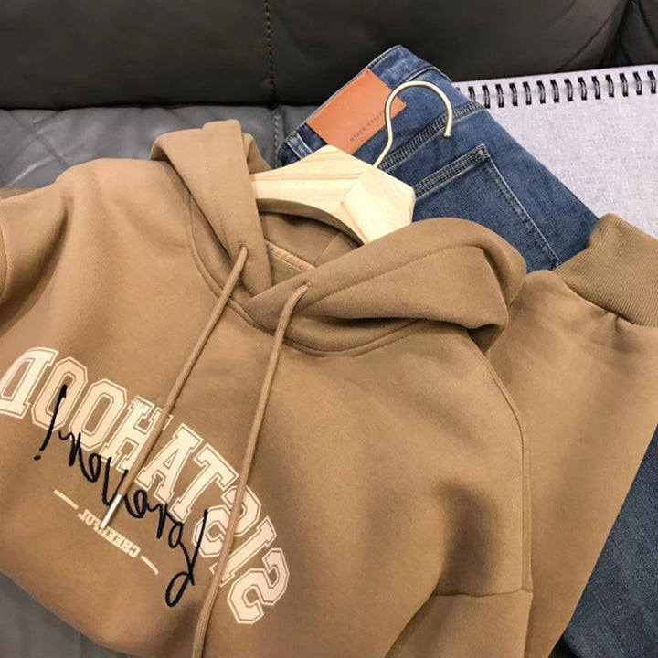Kvinnors hoodie med kreativt tryck och avslappnad oversize passform-Eva Jonsson