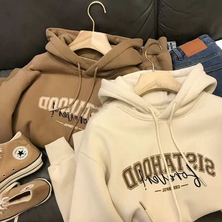 Kvinnors hoodie med kreativt tryck och avslappnad oversize passform-Eva Jonsson