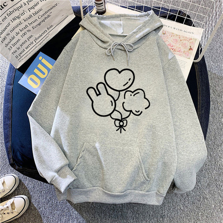 Kvinnors hoodie med lekfull grafisk design Mirla-Eva Jonsson