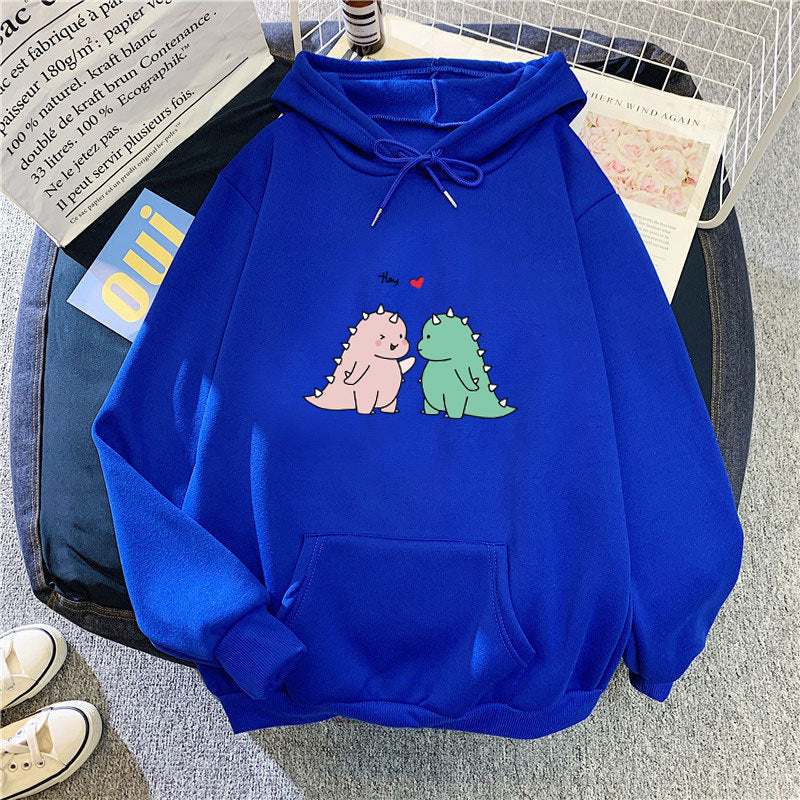 Kvinnors hoodie med lekfullt dinosaurmotiv Mirla-Eva Jonsson