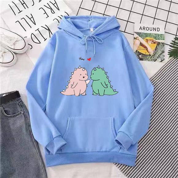 Kvinnors hoodie med lekfullt dinosaurmotiv Mirla-Eva Jonsson