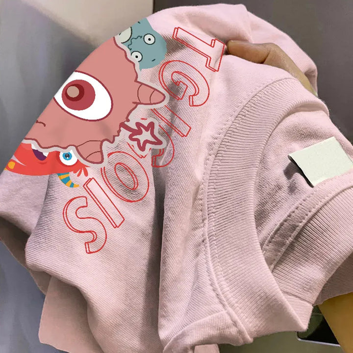 Kvinnors hoodie med lekfullt färgglatt djurtryck Mirla-Eva Jonsson