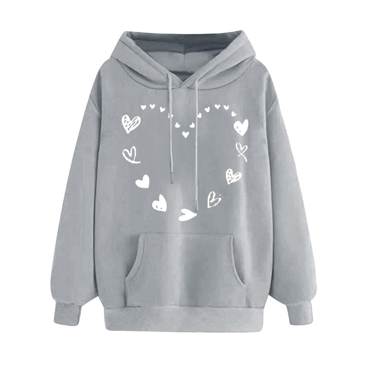 Kvinnors hoodie med lekfullt hjärtdesign och bekväm känguruficka Mirla-Eva Jonsson