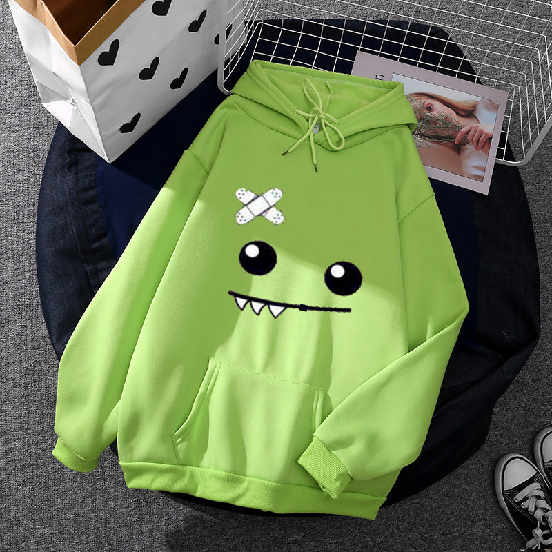Kvinnors hoodie med lekfullt monstermotiv Mirla-Eva Jonsson