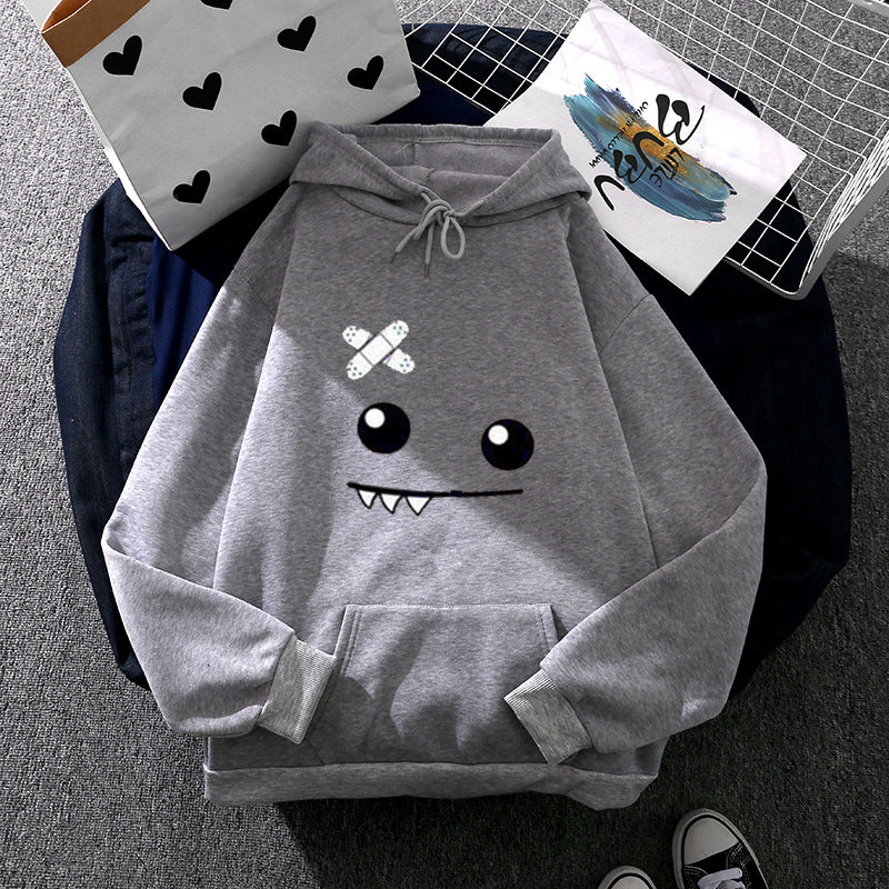 Kvinnors hoodie med lekfullt monstermotiv Mirla-Eva Jonsson