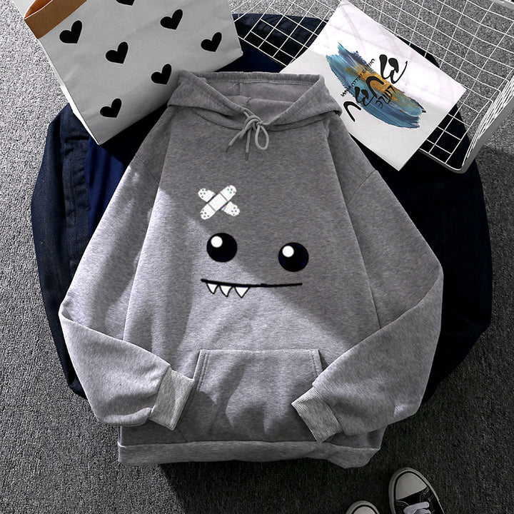 Kvinnors hoodie med lekfullt monstermotiv Mirla-Eva Jonsson