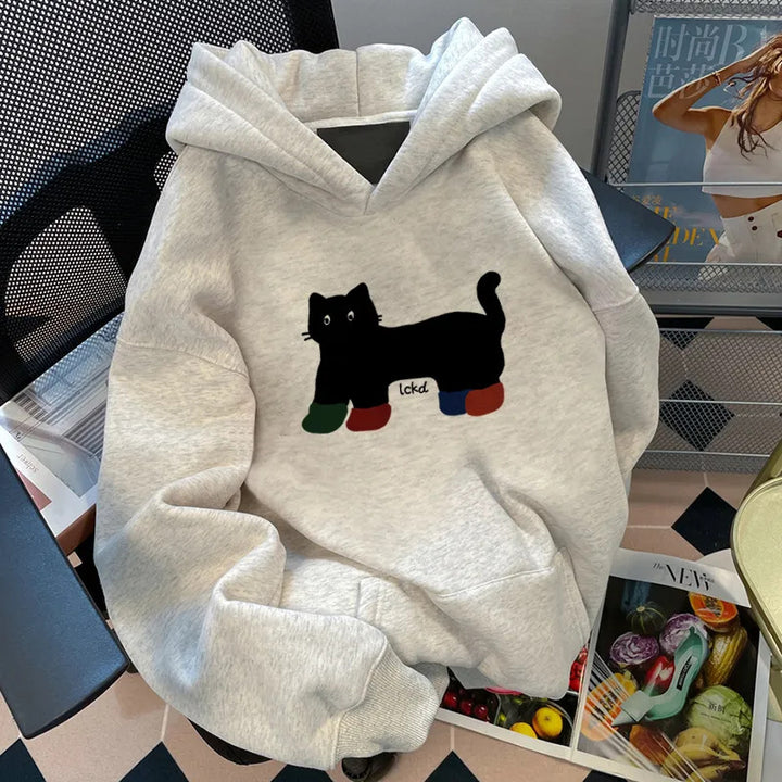 Kvinnors hoodie med loose fit och kreativ kattdesign Mirla-Eva Jonsson