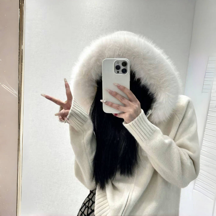 Kvinnors hoodie med lyxig pälskrage och praktiska fickor Mirla-Eva Jonsson