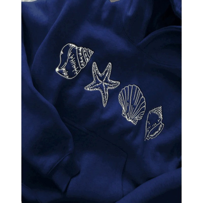 Kvinnors hoodie med maritimt motiv och mjukt tyg Mirla-Eva Jonsson