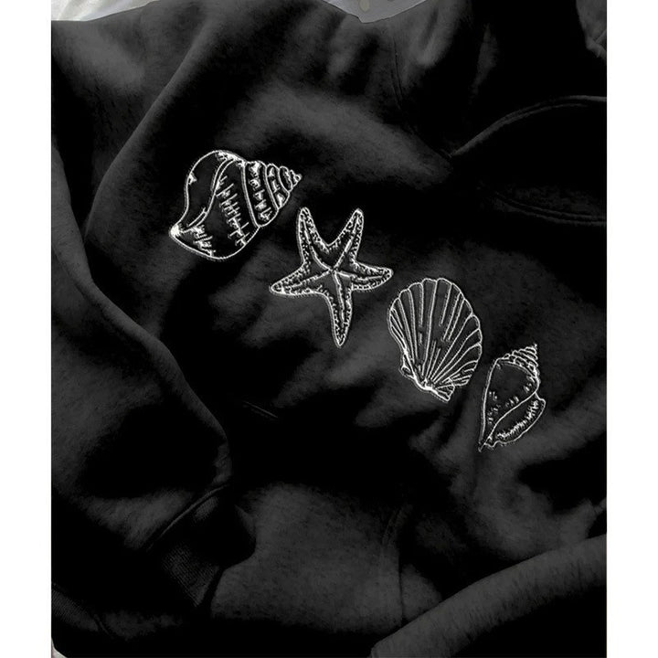 Kvinnors hoodie med maritimt motiv och mjukt tyg Mirla-Eva Jonsson