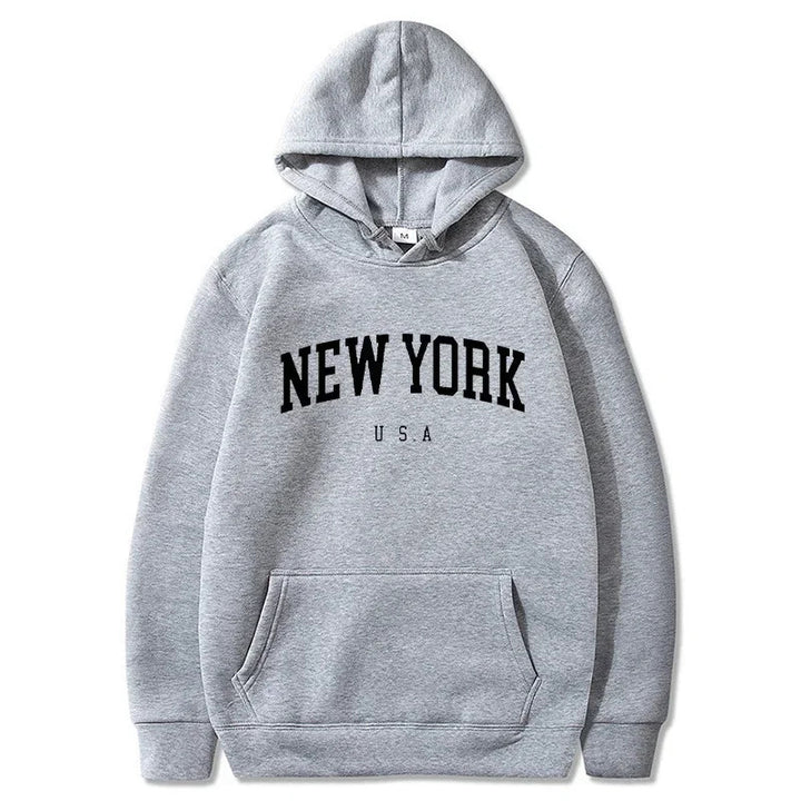 Kvinnors hoodie med moderiktigt New York-motiv och bekväm passform Mirla-Eva Jonsson