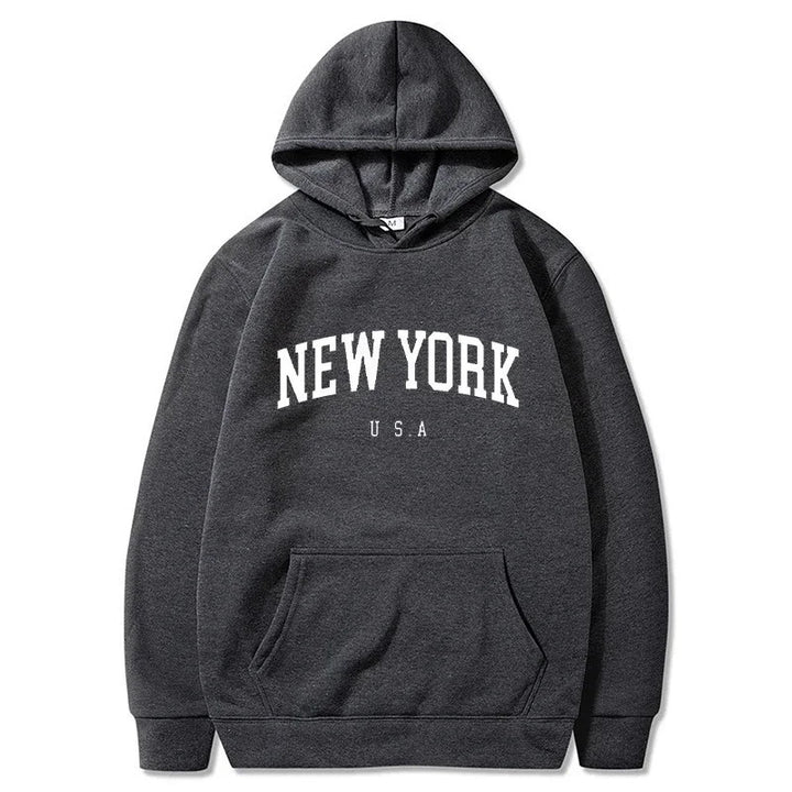 Kvinnors hoodie med moderiktigt New York-motiv och bekväm passform Mirla-Eva Jonsson