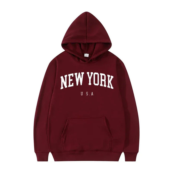 Kvinnors hoodie med moderiktigt New York-motiv och bekväm passform Mirla-Eva Jonsson