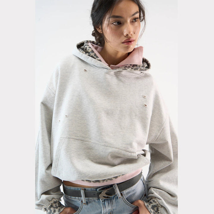 Kvinnors hoodie med modernt djurtryck och drömmande snitt Mirla-Eva Jonsson