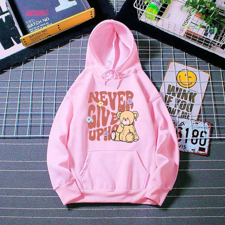 Kvinnors hoodie med motivationsdesign av björn Mirla-Eva Jonsson