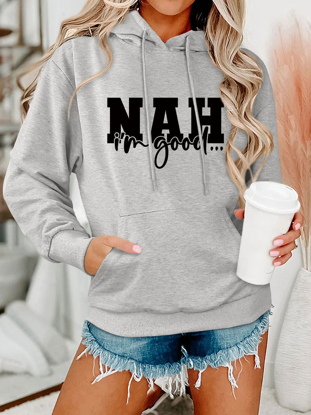 Kvinnors hoodie med motiverande text och bekväm passform Mirla-Eva Jonsson