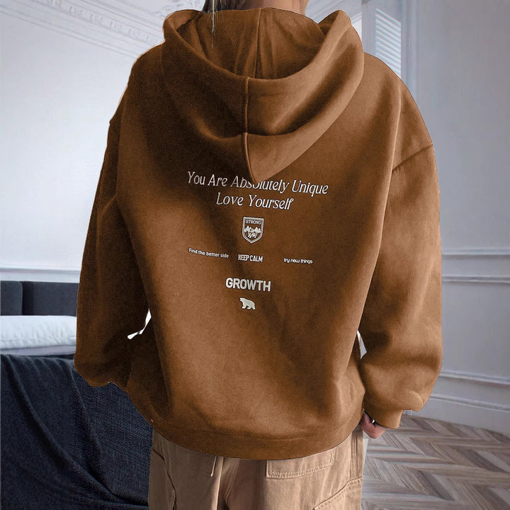 Kvinnors hoodie med motiverande text och bekväm passform Mirla-Eva Jonsson