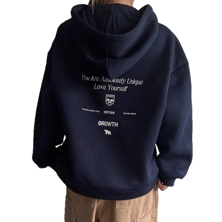 Kvinnors hoodie med motiverande text och bekväm passform Mirla-Eva Jonsson