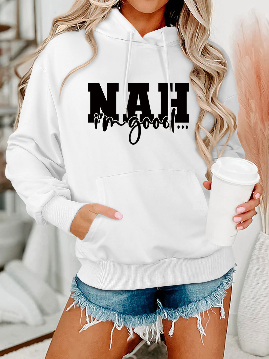 Kvinnors hoodie med motiverande text och bekväm passform Mirla-Eva Jonsson
