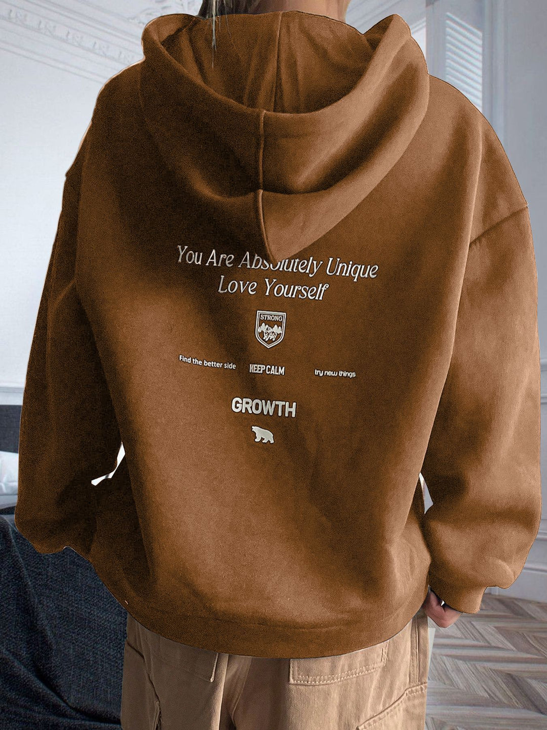Kvinnors hoodie med motiverande text och bekväm passform Mirla-Eva Jonsson