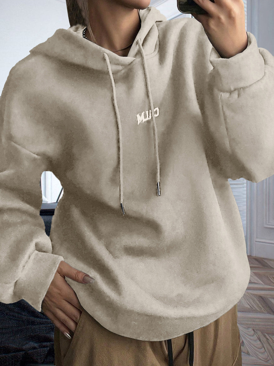 Kvinnors hoodie med motiverande text och bekväm passform Mirla-Eva Jonsson
