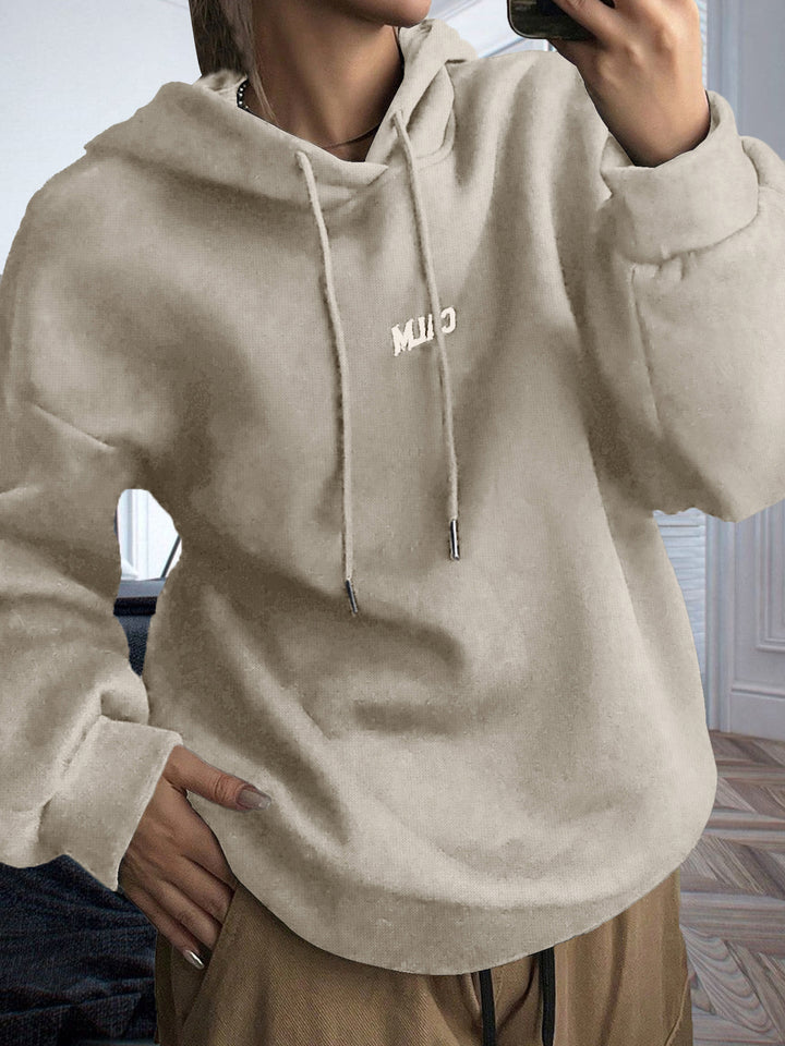 Kvinnors hoodie med motiverande text och bekväm passform Mirla-Eva Jonsson