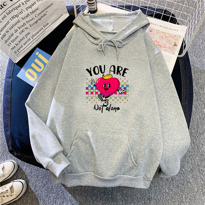 Kvinnors hoodie med rolig hjärtdesign Mirla-Eva Jonsson