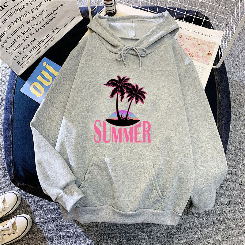 Kvinnors hoodie med sommarmotiv och tropiskt palmtryck Mirla-Eva Jonsson