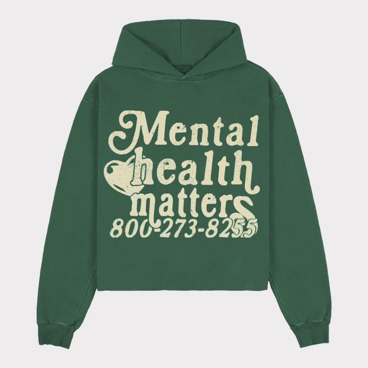 Kvinnors hoodie med statement tryck Mirla-Eva Jonsson