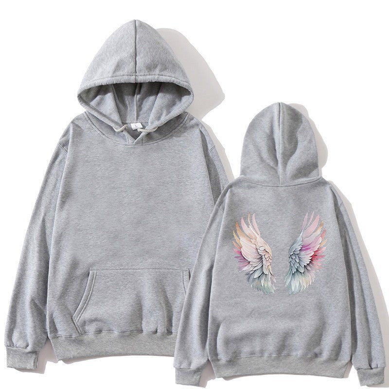 Kvinnors hoodie med stilfull design av änglavingar Mirla-Eva Jonsson