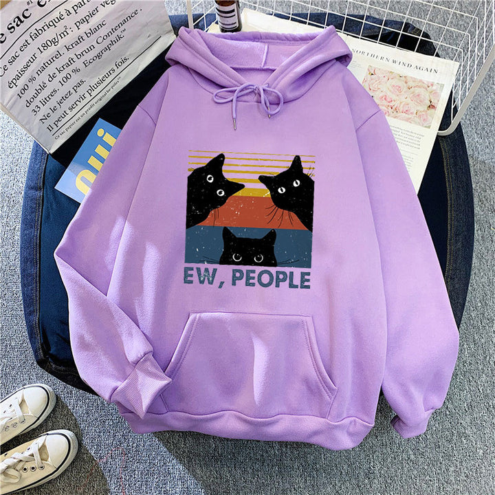 Kvinnors hoodie med stilfullt kattmotiv och inspirerande text Mirla-Eva Jonsson