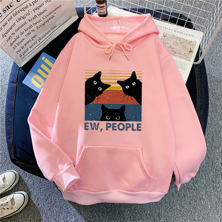 Kvinnors hoodie med stilfullt kattmotiv och inspirerande text Mirla-Eva Jonsson