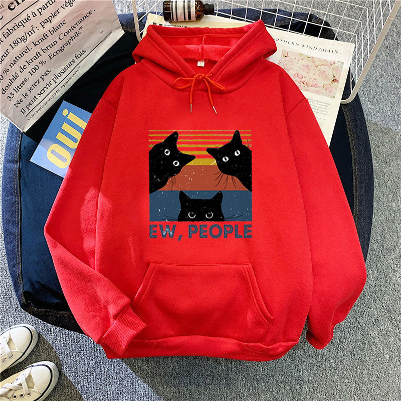 Kvinnors hoodie med stilfullt kattmotiv och inspirerande text Mirla-Eva Jonsson