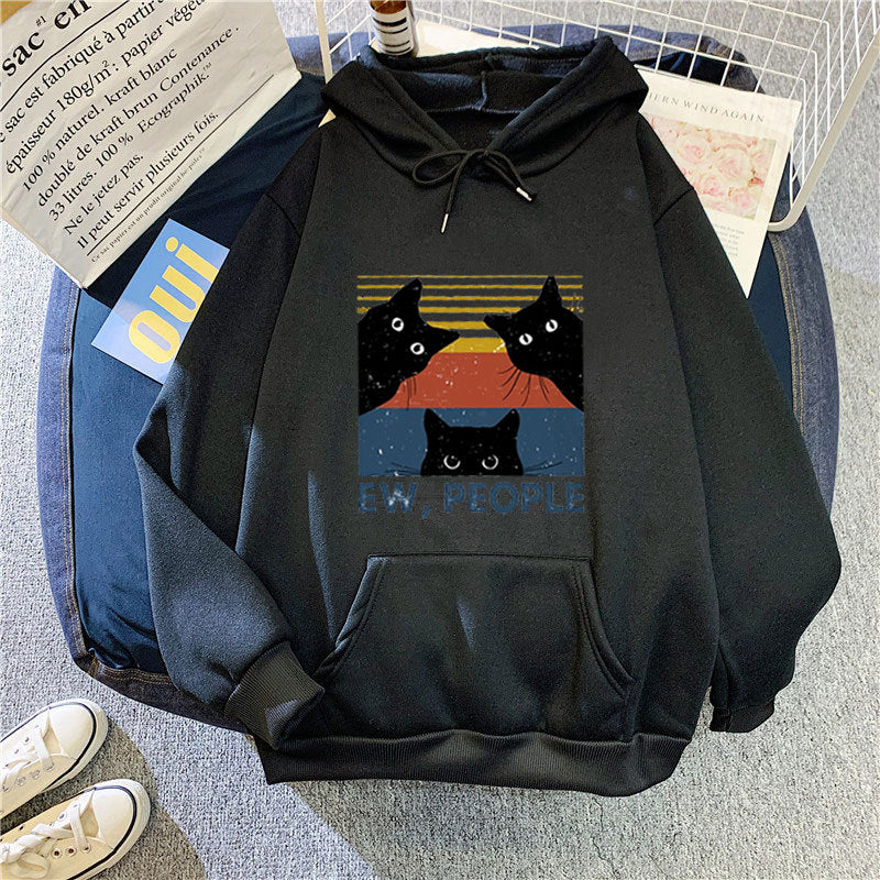 Kvinnors hoodie med stilfullt kattmotiv och inspirerande text Mirla-Eva Jonsson