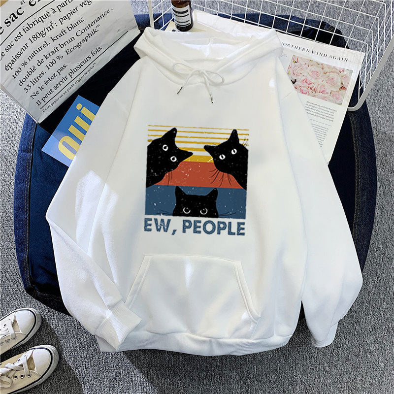 Kvinnors hoodie med stilfullt kattmotiv och inspirerande text Mirla-Eva Jonsson
