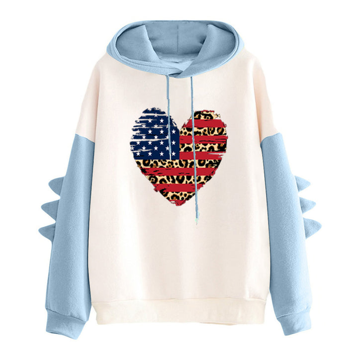 Kvinnors hoodie med unik hjärtdesign och trendiga detaljer Mirla-Eva Jonsson