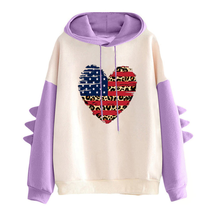 Kvinnors hoodie med unik hjärtdesign och trendiga detaljer Mirla-Eva Jonsson