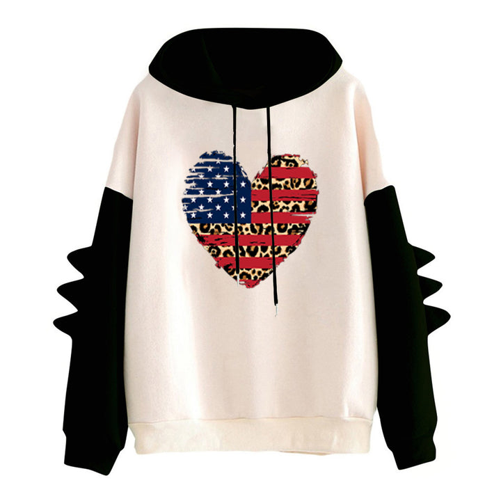 Kvinnors hoodie med unik hjärtdesign och trendiga detaljer Mirla-Eva Jonsson